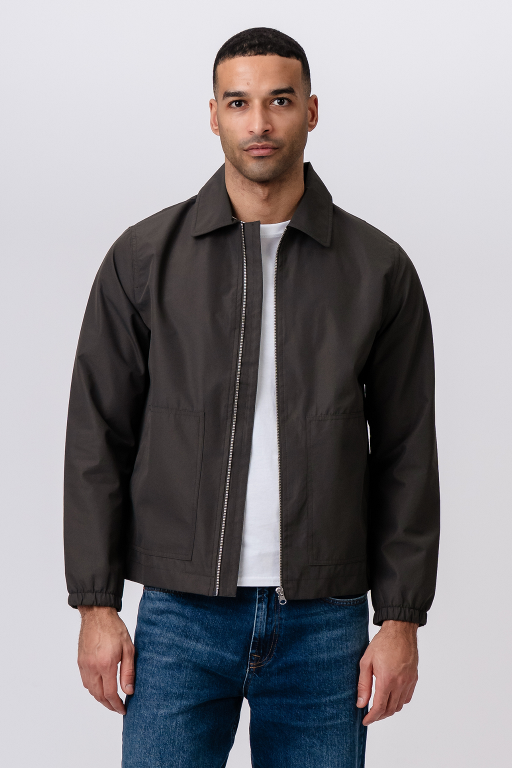 Trumpa striukė su užtrauktuku – tamsiai žalia