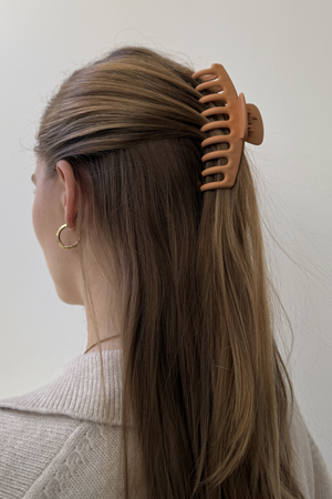 Nagų klipas - oranžinė